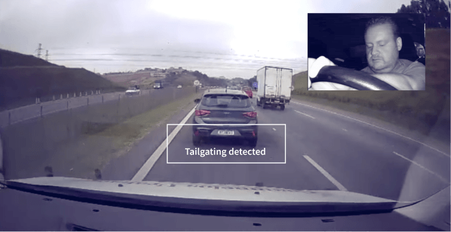 Driver following the vehicle ahead too closely and camera alerting about the risk.